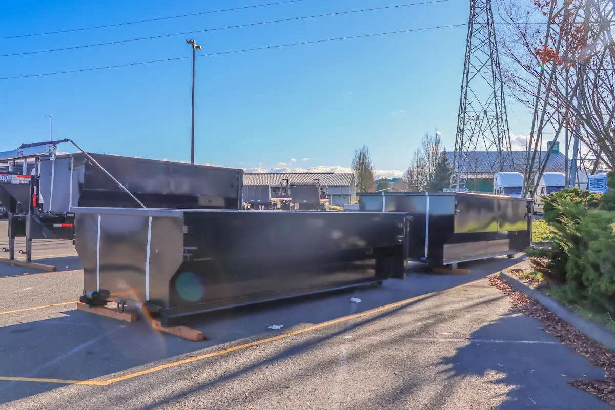 Roll-off dumpster ready for waste disposal at job site for Concrete Dumpster Rental in Reading